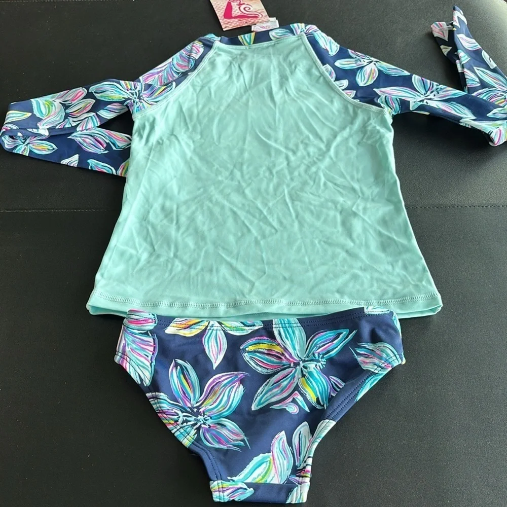 Kanu Surf UPF 50+ Charlotte 2 piece bikini,floral bottom,long sleeve rashguard